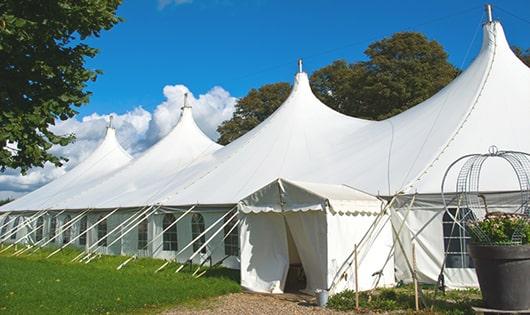 high-quality porta potties stationed at a wedding, meeting the needs of guests throughout the outdoor reception in Haskins